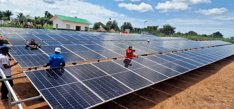 Installation crew mounting solar panels